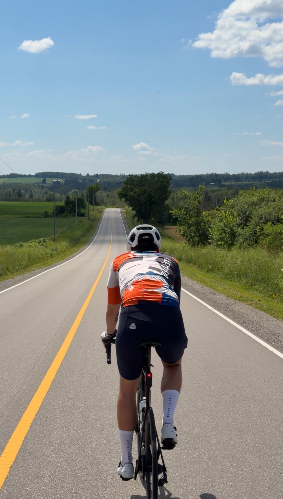 Riding a rolling farm road through Innisfil country
