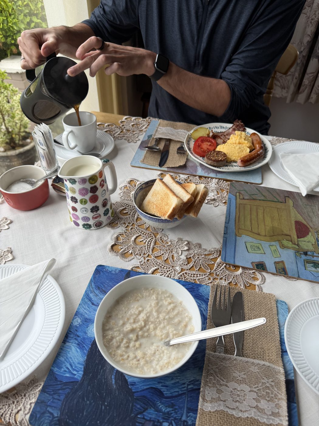 A full Irish breakfast with porridge, toast and fresh coffee